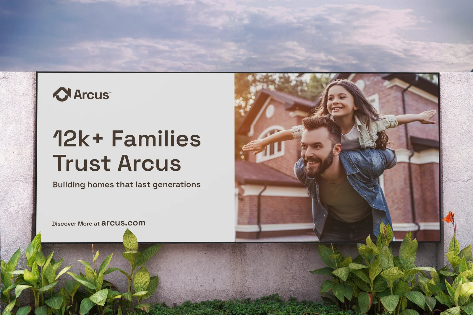 Arcus billboard reading 12k+ Families Trust Arcus beside a family photograph