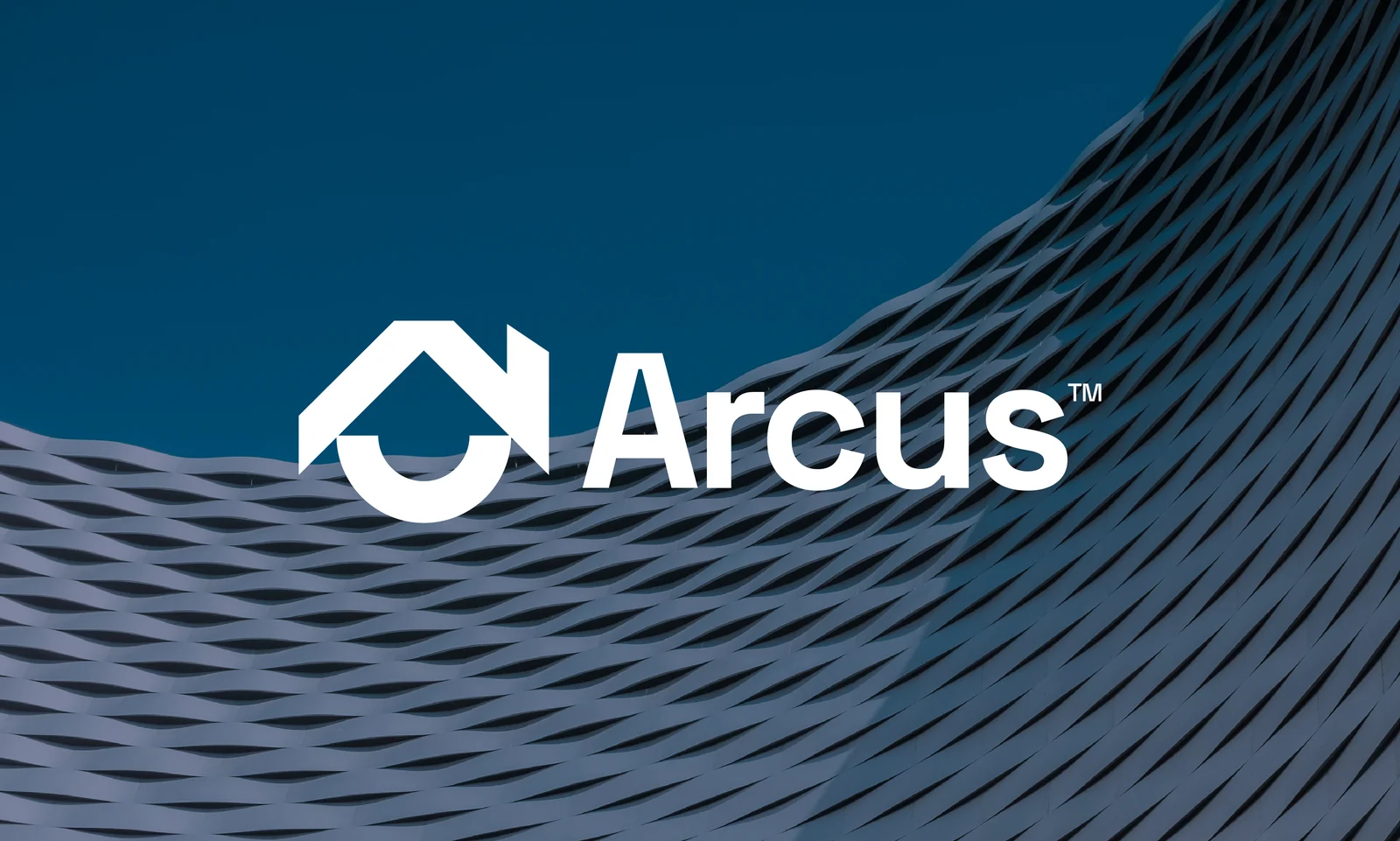 The Arcus monogram and wordmark in white over a deep navy architectural facade